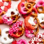 pretzels decorated for valentines day with sprinkles