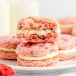 featured image of strawberry cake mix sandwich cookies with bite taken out